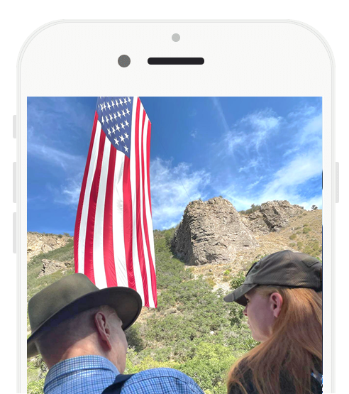 Candy Bomber and Julia under the flag